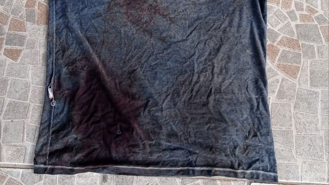 Camisa que o pai da criança usava
